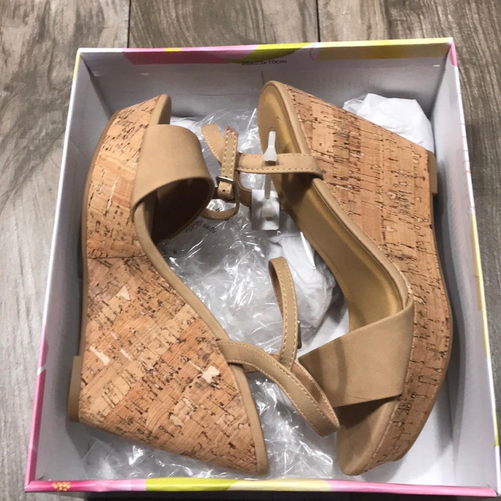 Brand new wedges from buckle size 8.5